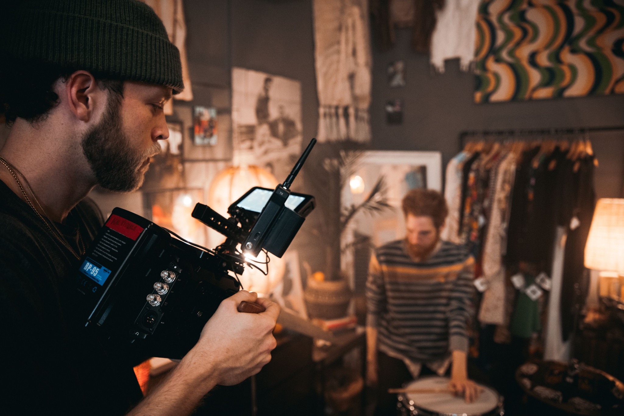 Camera operator filming a scene on set